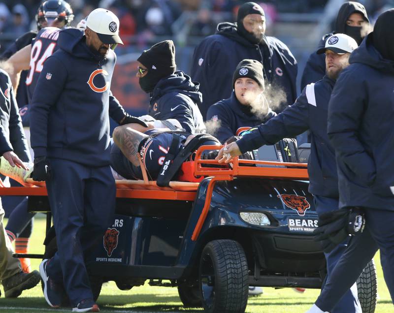 Chicago Bears offensive tackle Teven Jenkins is carted off the field during their game against the Eagles Sunday, Dec. 18, 2022, at Soldier Field in Chicago.