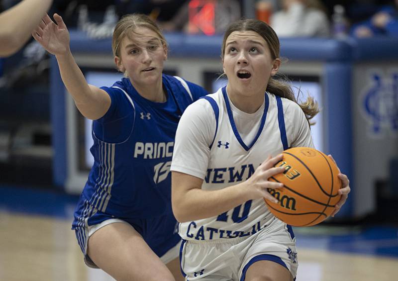 Newman’s Elaina Allen drives towards the hoop against Princeton Thursday, Jan. 15, 2026.