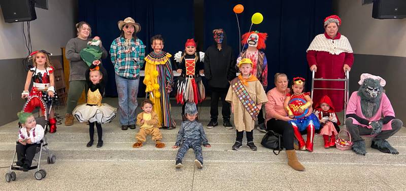 The winners of the annual Rock Falls Halloween that was held Sunday, Oct. 30, are (front row, left to right): Linken Perales, Hazel Perales, Mary Lynne McAdams, Noah Gutierrez, Hayden Baker, Ryder Sondgeroth, Lola Perales, Olivia Baldwin, and Brayden Williamsen. (Second row): Olivia Thayer, Emma Rumley, Kayden Fargher, Amalya Fargher, Dreaven Schick, Trevor Fargher, and Lori McLindsay. The winners of the "Best of Show" category are: first place, Olivia Baldwin, Brayden Williamsen, and Lori McLindsay. Emma Rumley finished second, and Linken Perales finished third. All contestants received a bag of Halloween candy and prize money for participating.