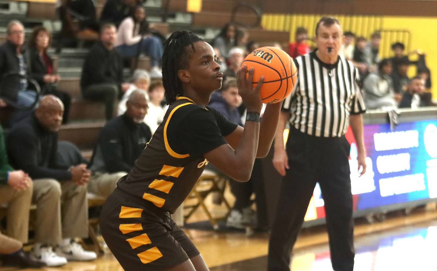 Jacobs’ Malachi Bell sets up an outside shot against Grayslake Central’s in varsity boys basketball Hinkle Holiday Classic action on Tuesday, Dec. 23, 2025, at Jacobs High School in Algonquin.