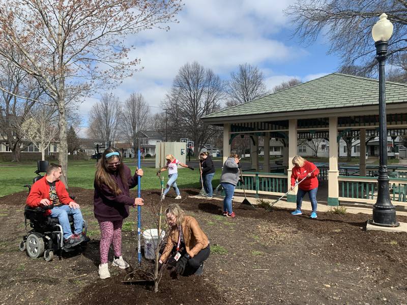 Holly Hall’s students from Ottawa High School helped clean out flower beds and lay mulch in the East Side Park on Thursday, April 21, 2022.