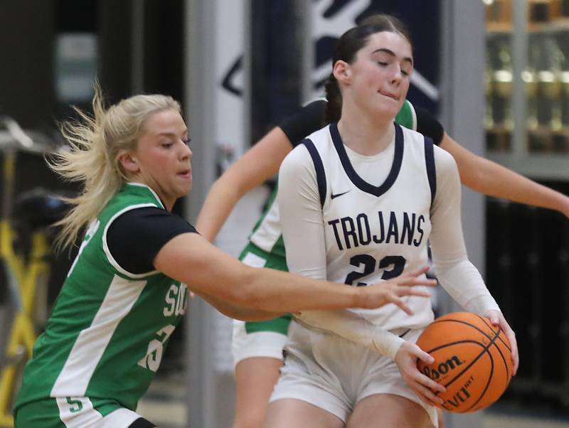 Crystal Lake South's Laken LePage tries to steal th ball from Cary-Grove's Avery Hoffman during a Fox Valley Conference girls basketball game on Tuesday, Dec. 2, 2025, at Cary-Grove High School in Cary.