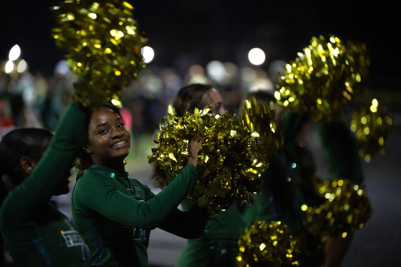 Bishop McNamara cheerleaders lead the crowd in a cheer in a game against Chicago Christian on Friday, September 19, 2025.