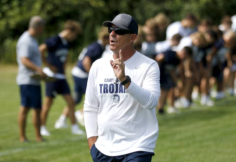 Cary-Groves head coach Brad Seaburg talks to the players during Cary-Grove’s first football practice of the upcoming season on Monday, August 11, 2025, at Cary-Grove High School.