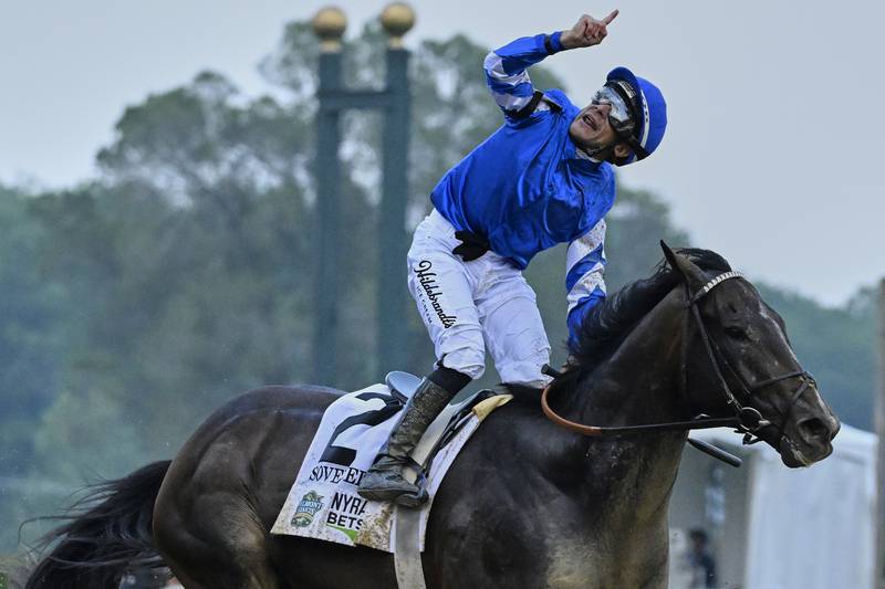 Jockey Junior Alvarado reacts aboard Sovereignty (2), after crossing the finish line to win the 157th running of the Belmont Stakes horse race, Saturday, June 7, 2025, in Saratoga Springs, N.Y. (AP Photo/Jessica Hill)