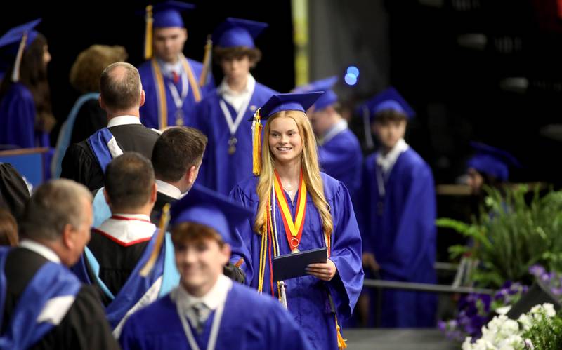 Geneva High School graduate Lilly Coats receives her diploma during the school’s 2024 commencement ceremony at Northern Illinois University in DeKalb on Tuesday, May 28, 2024.