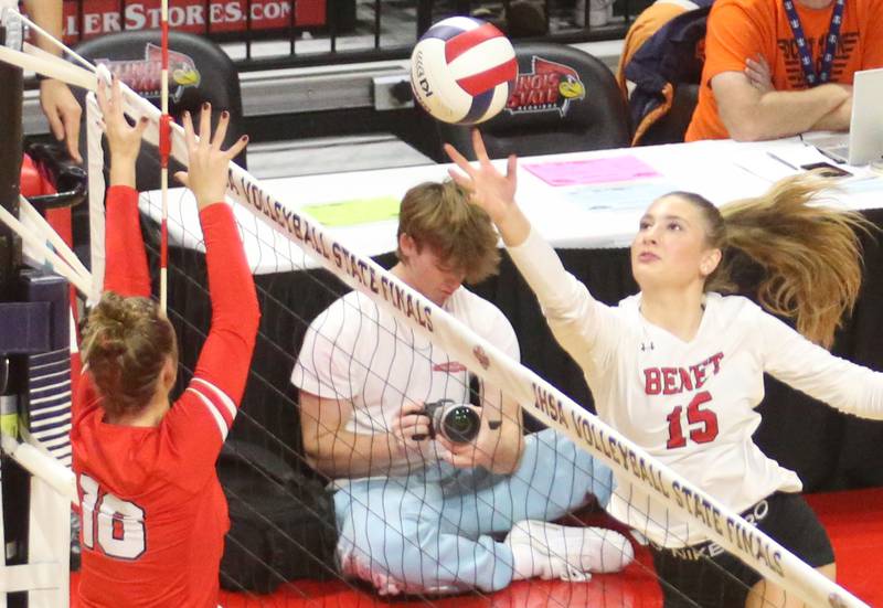 Benet Academy's Morgan Asleson returns a serve from Huntley during the Class 4A State semifinal game on Friday, Nov. 15, 2024 at CEFCU Arena in Normal.