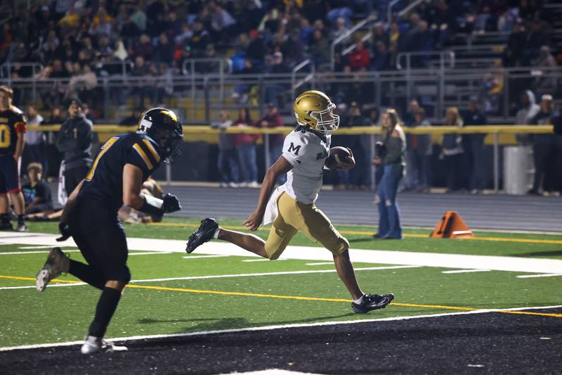 Bishop McNamara's Micah Lee runs in a touchdown during the Fightin' Irish's 45-28 victory over Herscher on Friday, Sept. 5, 2025.