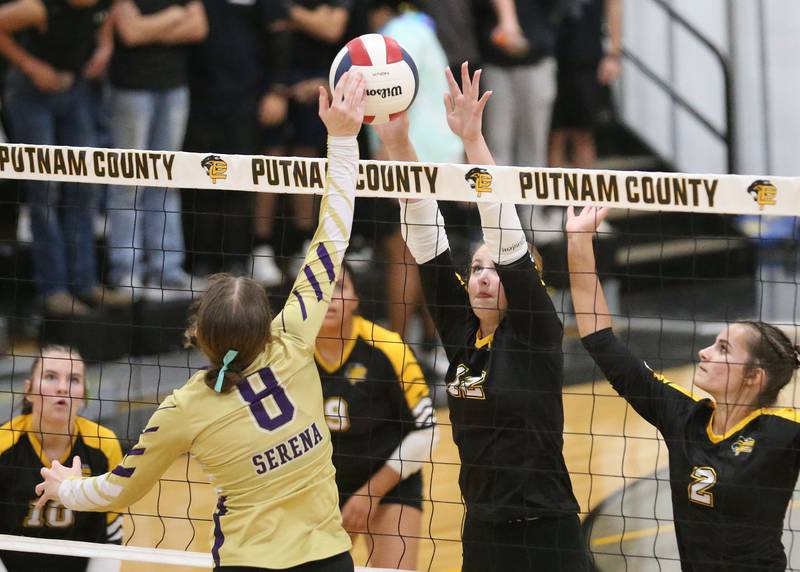 Putnam County's Chloe Parcher blocks a spike from Serena's REbekah Shugrue on Monday, Sept. 22, 2025 at Putnam County High School.
