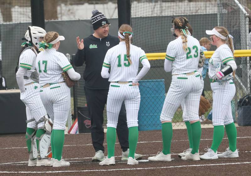 Seneca head coach Brian Holman talks to his team on the mound while playing Geneseo on Thursday, March 12, 2026 at Seneca High School.