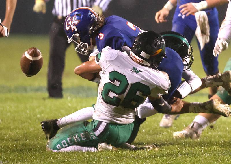 Rock Falls' Korbin Oligney forces Genoa-Kingston's Austin Braffet to fumble during their game Friday, Oct. 13, 2023, at Genoa-Kingston High School.