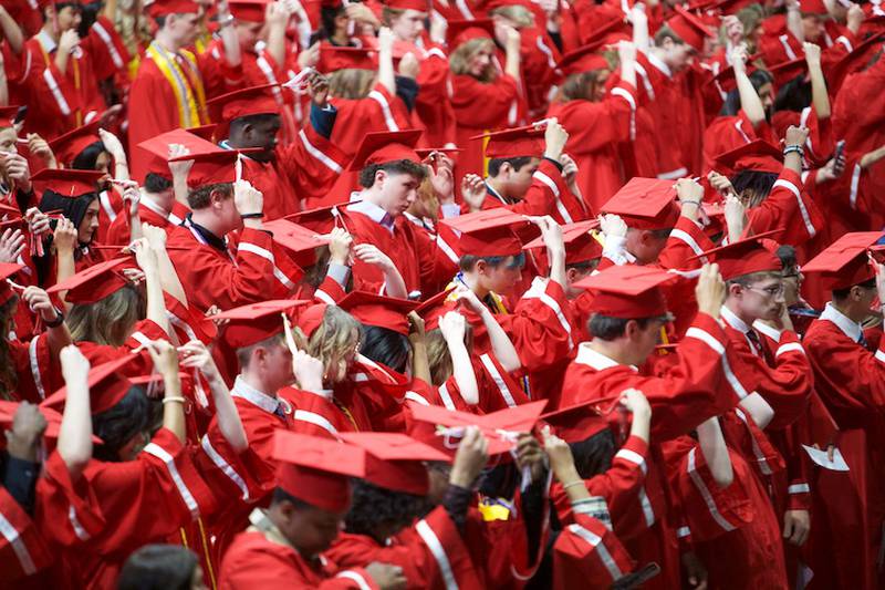 Yorkville High School Graduates move the tassel during the Commencement Ceremony at NIU Convocation Center on Friday, May 16, 2025 in DeKalb.