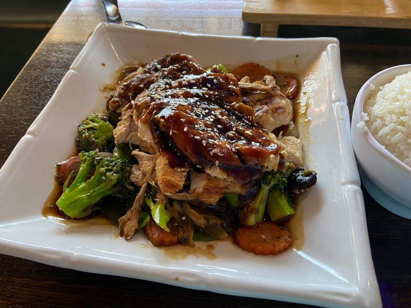 My fellow diner selected for her main dish at Yummy Asian Bistro, chicken teriyaki, which came with a side of rice and a salad.