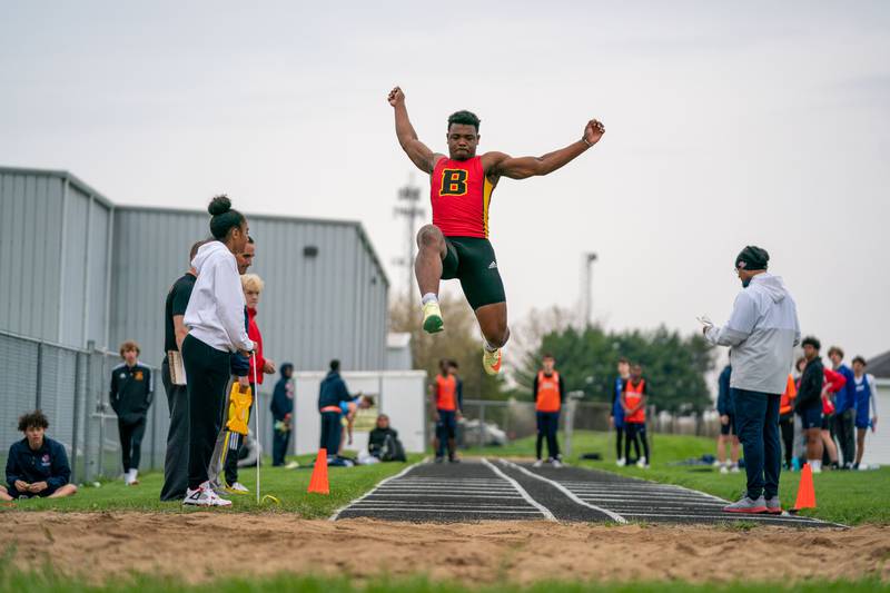 Batavia’s Jalen Buckley competes in the long jump during the Roger Wilcox Track and Field Invitational at Oswego High School on Friday, April 29, 2022.