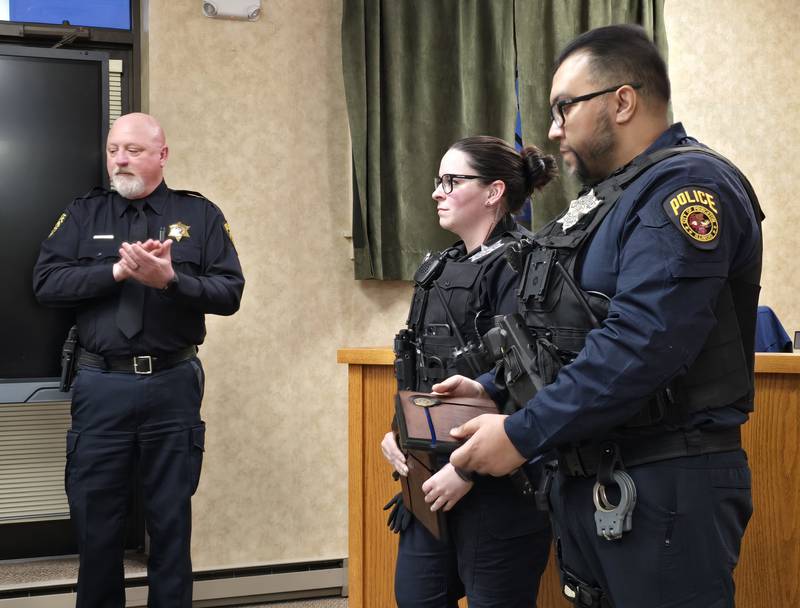 Princeton police officers Kelsey Kowalski (left) and Alejandro Jaramillo were honored Tuesday, March 4, 2025, during the Princeton City Council meeting.
