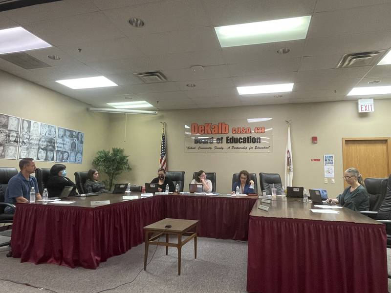 Members of the DeKalb District 428 school board are seen Sept. 6, 2022 engaging in discussing at their bimonthly board meeting.