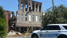 Two still missing after fire destroys downtown Sterling apartment building