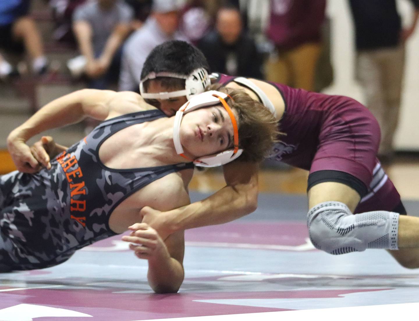 McHenry’s Brayden Oeffling, left, battles Prairie Ridge’s Leo Ruiz at 138 pounds in varsity boys wrestling on Thursday, Jan. 8, 2026 at Prairie Ridge High School in Crystal Lake.