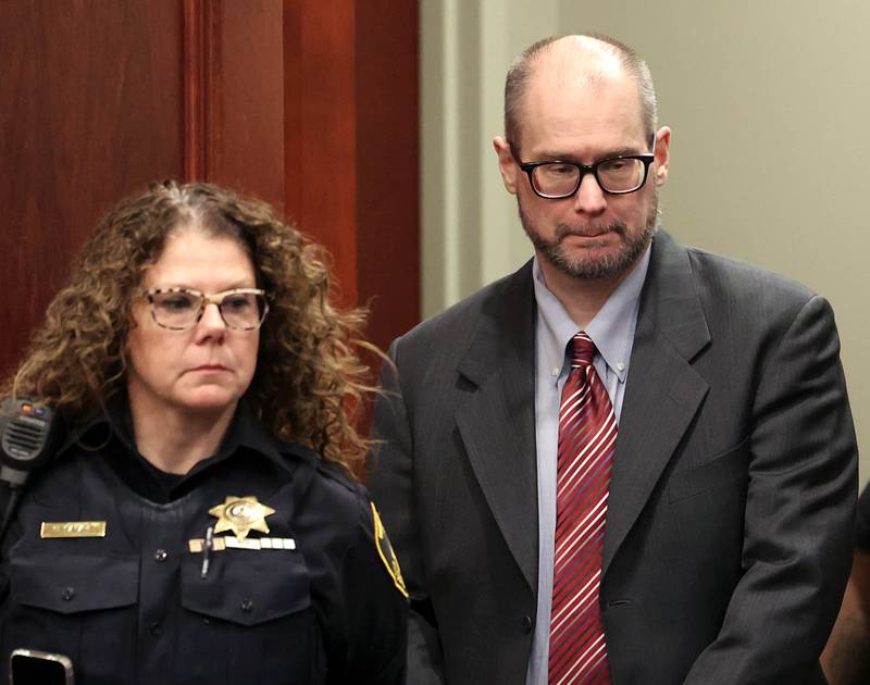 Jonathan D. Hurst enters the courtroom for the reading of the verdict Thursday, Jan. 30, 2025, during day his trial at the DeKalb County Courthouse in Sycamore. Hurst is charged in the 2016 killings of elderly mother and son Patricia and Robert Wilson in Sycamore.
