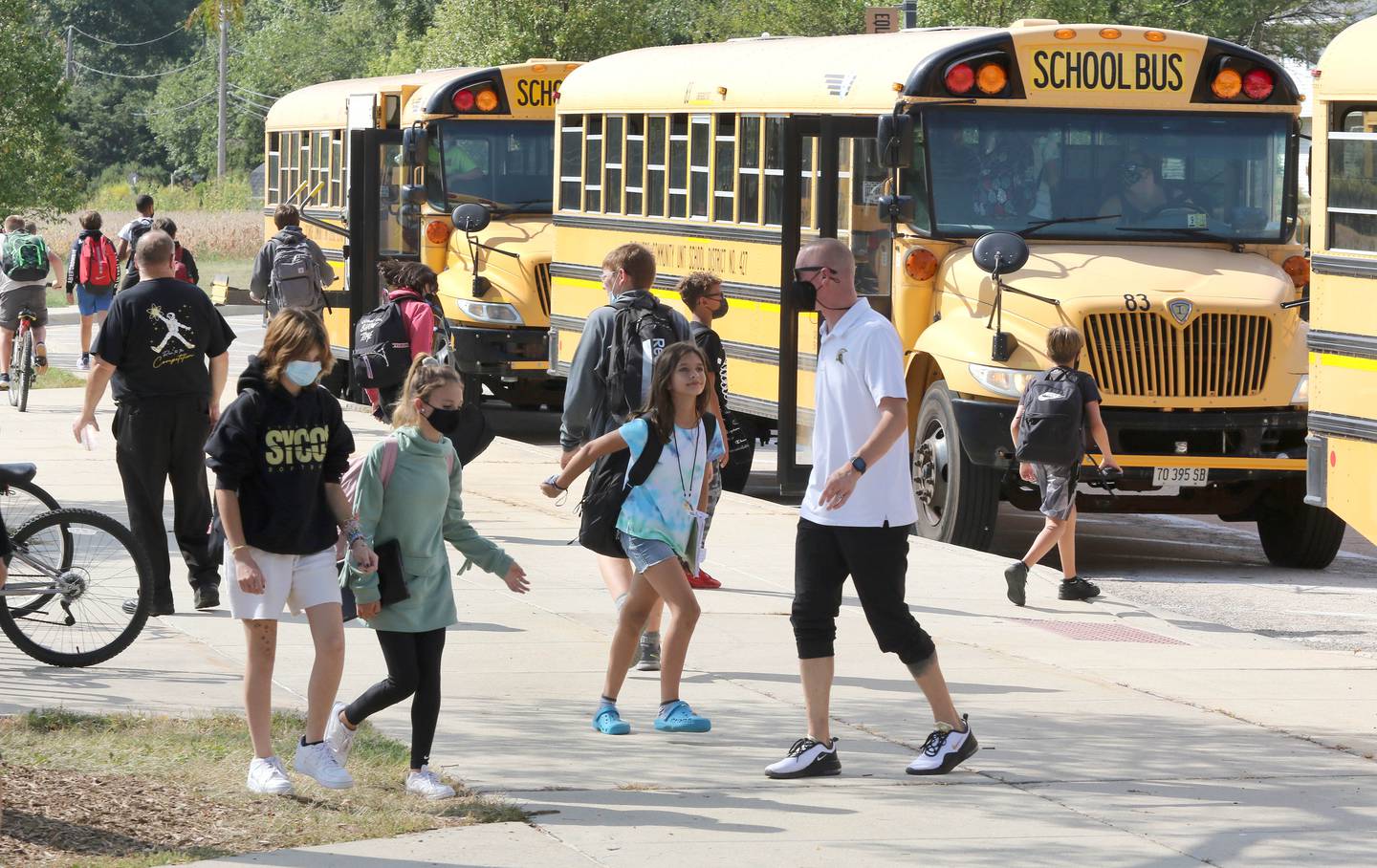 Students at Sycamore Middle School head for their buses Friday, Sep. 17, 2021 at the end of the school day.