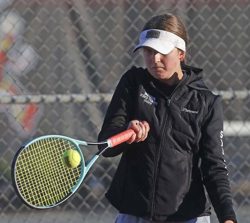 Sycamore's Maysen Pethoud returns the ball Thursday, Oct. 23, 2025, during the first day of the IHSA State Girls Tennis Tournament at Schaumburg High School.