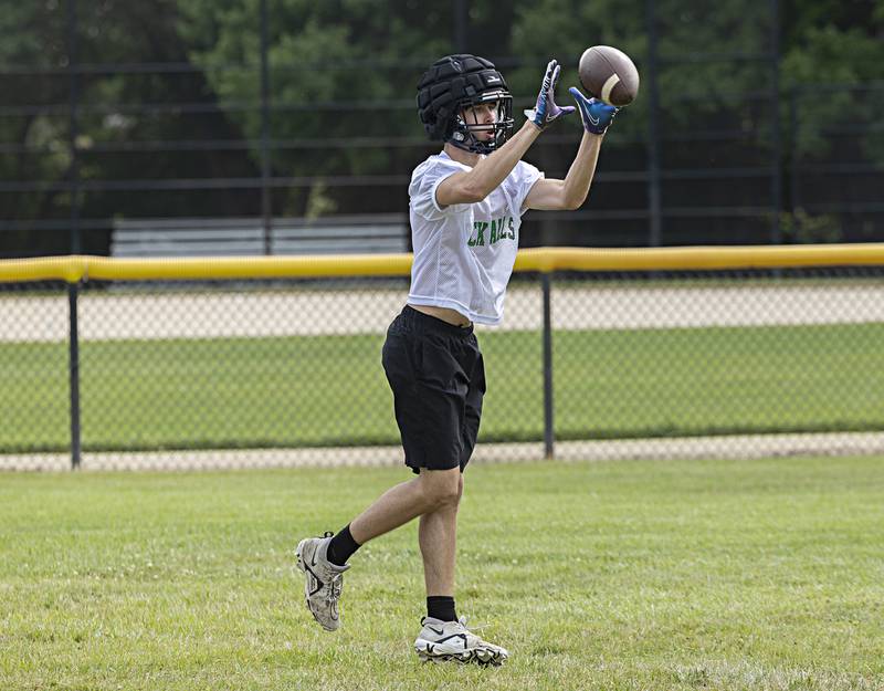 Rock Falls players run through drills Tuesday, August 8, 2023 during the first week of football practice.