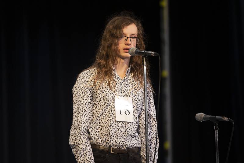 Reagan Middle School eighth grader Nathan Stauter appears on stage Thursday, March 9, 2023 during the Lee-Ogle-Whiteside Regional Spelling Bee.