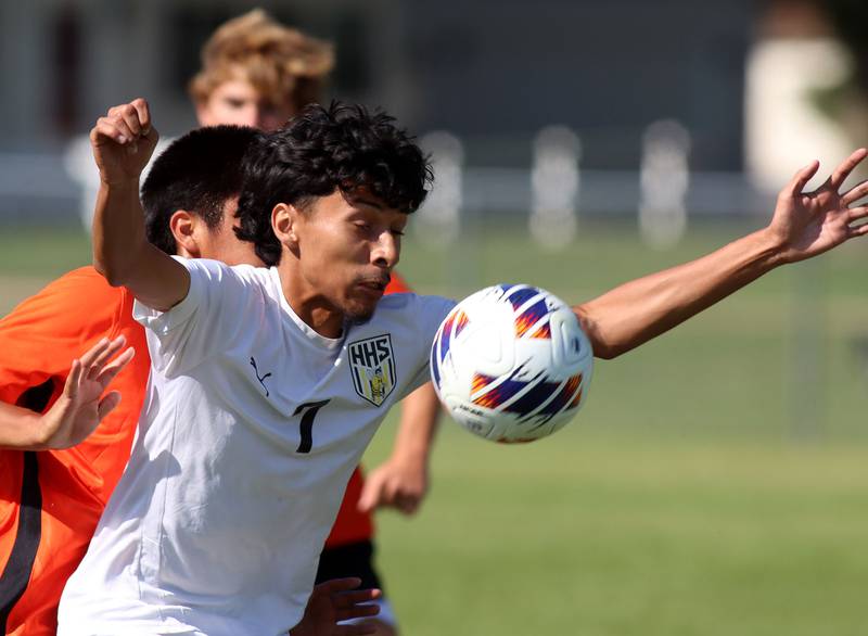 Harvard’s Jesus Aquino corrals the ball in varsity boys soccer at Crystal Lake Central High School in Crystal Lake on Saturday, Sept. 6, 2025.