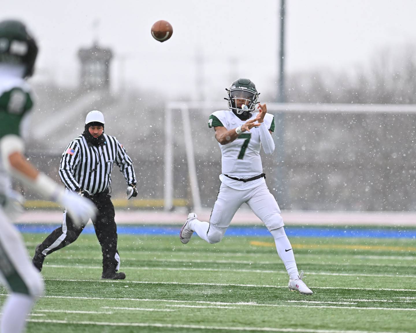 Glenbard West's Korey Tai (7) throws a pass during the IHSA Class 8A semifinals on Saturday, November, 19, 2022, at Frankfort.