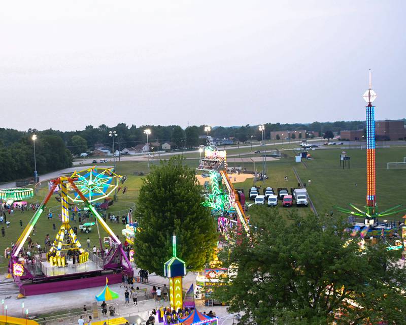 Carnival rides are in use during PrairieFest on Thursday June 12, 2025, held at PrairieFest Park in Oswego.