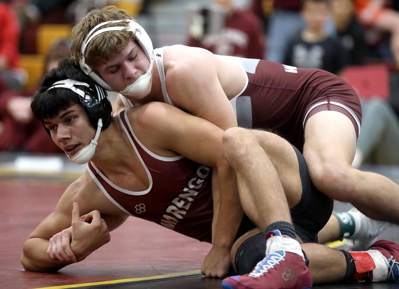 Wheaton Academy’s Tyler Jones controls Marengo’s Gavin Baros during a175-pound match in the Tom DuBois Invite wrestling meet on Saturday, Dec. 13, 2025, at Richmond-Burton High School in Richmond.