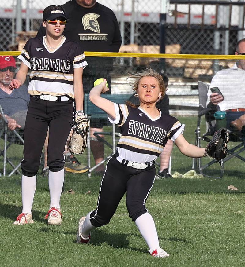 Sycamore's Addison McLaughlin gets the ball back into the infield during their game against LaSalle-Peru Tuesday, April 11, 2023, at Sycamore High School.