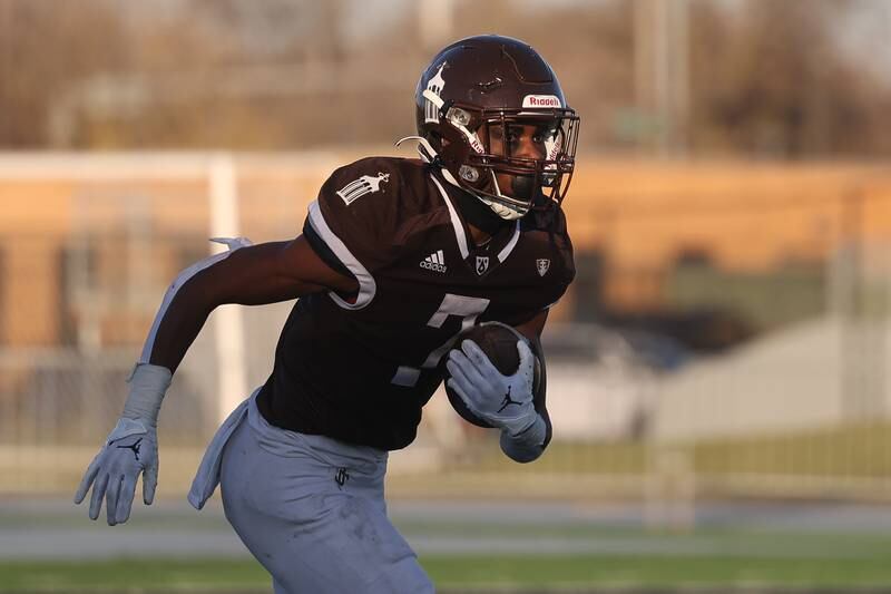 Joliet Catholic’s HJ Grigsby returns a kick against Providence in the Class 5A semifinal on Saturday, Nov. 18, 2023, in Joliet.