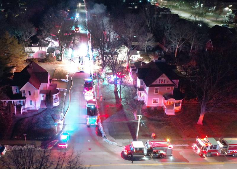 Firefighters work the scene of a structure fire in the 300 block of South Chestnut Street on Friday, Dec. 19, 2025 in Princeton. Fire departments from  from Malden, Bureau, Walnut, Princeton, Spring Valley, Ladd and Wyanet all responded to the scene.