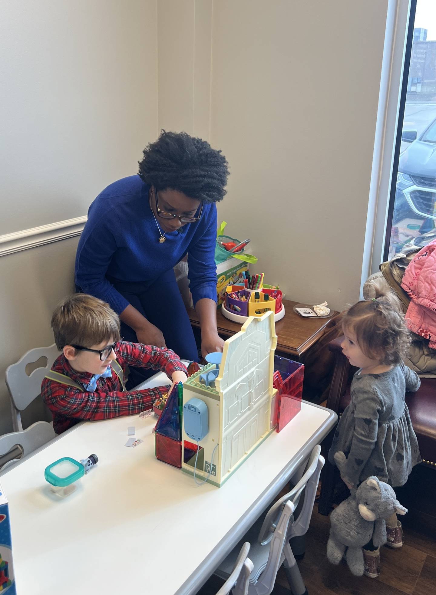 Sycamore siblings, Harvey and Sylvie Kleinfeldt, meet with U.S. Rep. Lauren Underwood, D-Naperville, inside her DeKalb office on Jan. 17, 2026.