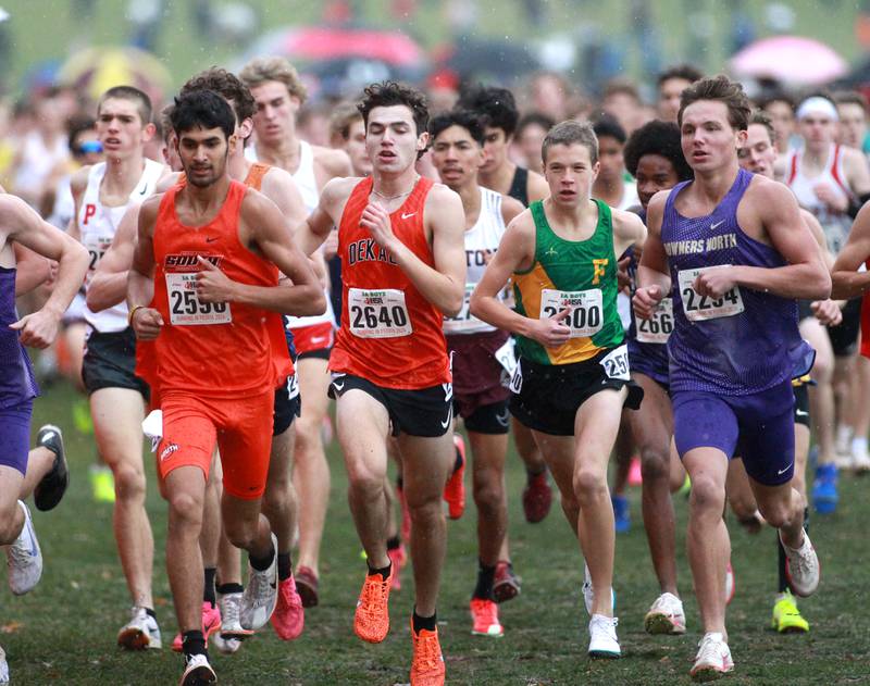Wheaton Warrenville South's Josiah Narayanan (left) and DeKalb’s Jacob Barraza (right) compete in the Class 3A State Cross Country Championships on Saturday, Nov. 9, 2024 at Detweiller Park in Peoria.