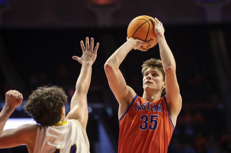 Eastland’s Parker Krogman puts up a shot in the first half against Peoria Christian Thursday, March 13, 2025, during the Class 1A boys basketball state semifinal.