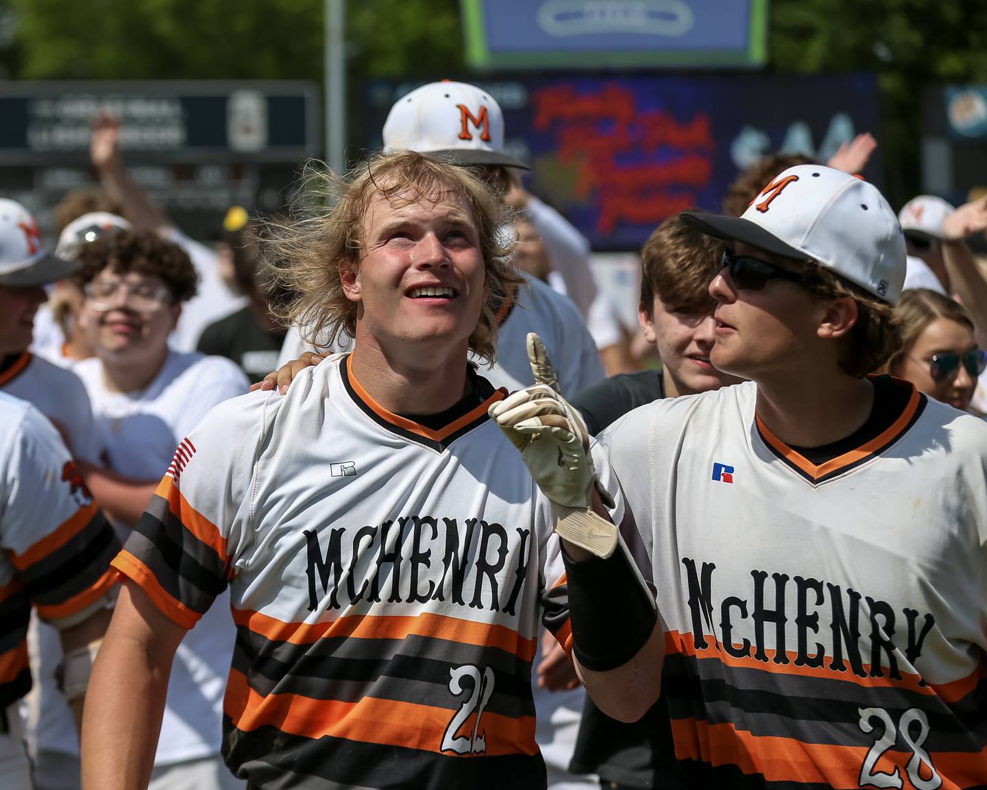 McHenry celebrates with Ricky Powell (22) after he hit the game winner to defeat York in the Class 4A Supersectional game. June 7, 2022.