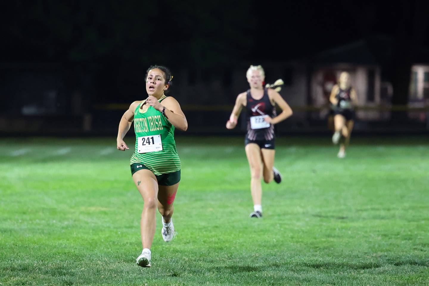 Bishop McNamara's Ana Franceschini secures her lead on the final stretch during the All-City cross country meet at Bishop McNamara on Wednesday, Sept. 17, 2025.