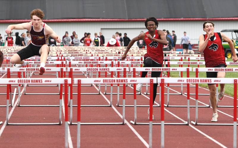 Forreston-Polo's Eli Ferris (left) races  Shabbona-Indian Creek's Amir Brown (center) and Jason Brewer (right) to the finish line in the 110 hurdles at the 1A Oregon Sectional on Friday, May 22, 2026. Ferris finished first, Brewer second, and Brown third.