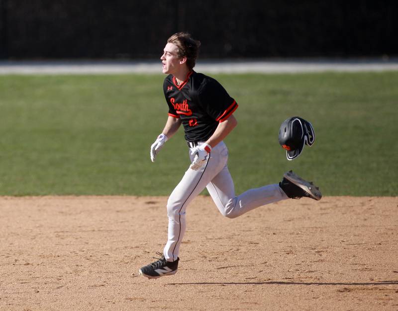 Wheaton Warrenville South's Aidan Quartz runs to third base during a game against Geneva on Monday April 14, 2025 in Wheaton.