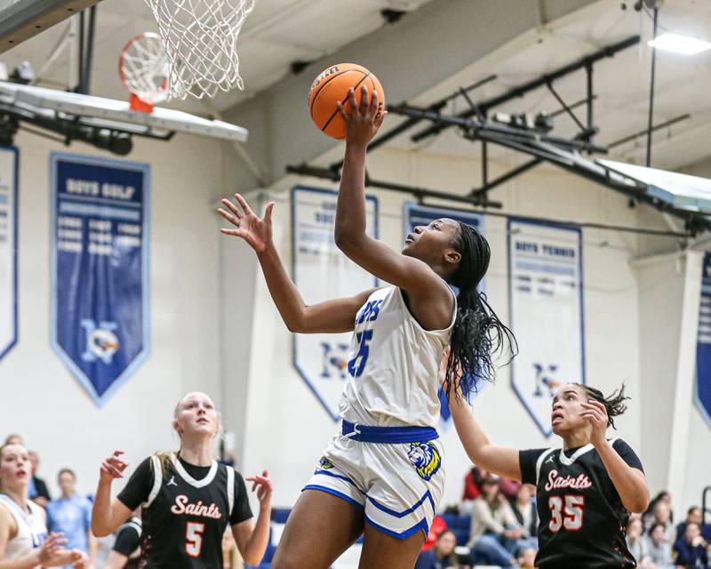 Lyon's Nora Ezike (25) puts up a shot during their Coach Kipp's Hoopfest basketball game between Lyons at St Charles East. Jan 18, 2025 in La Grange.