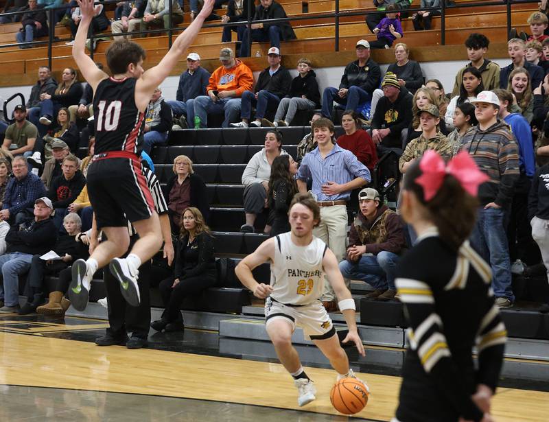 Putnam County's Braden Bickerman fakes out Henry-Senachwine's Wyatt Wealer on Friday, Dec. 5, 2025 at Putnam County High School.