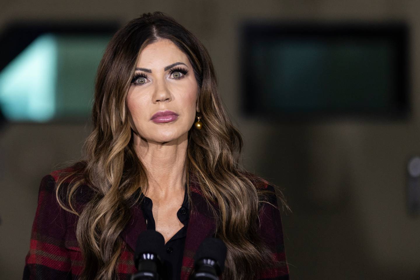 U.S. Department of Homeland Security Secretary Kristi Noem discusses recent results of Operation Midway Blitz during a news conference at a National Guard facility in Gary, Indiana, Thursday, Oct. 30, 2025. (Ashlee Rezin/Chicago Sun-Times via AP)