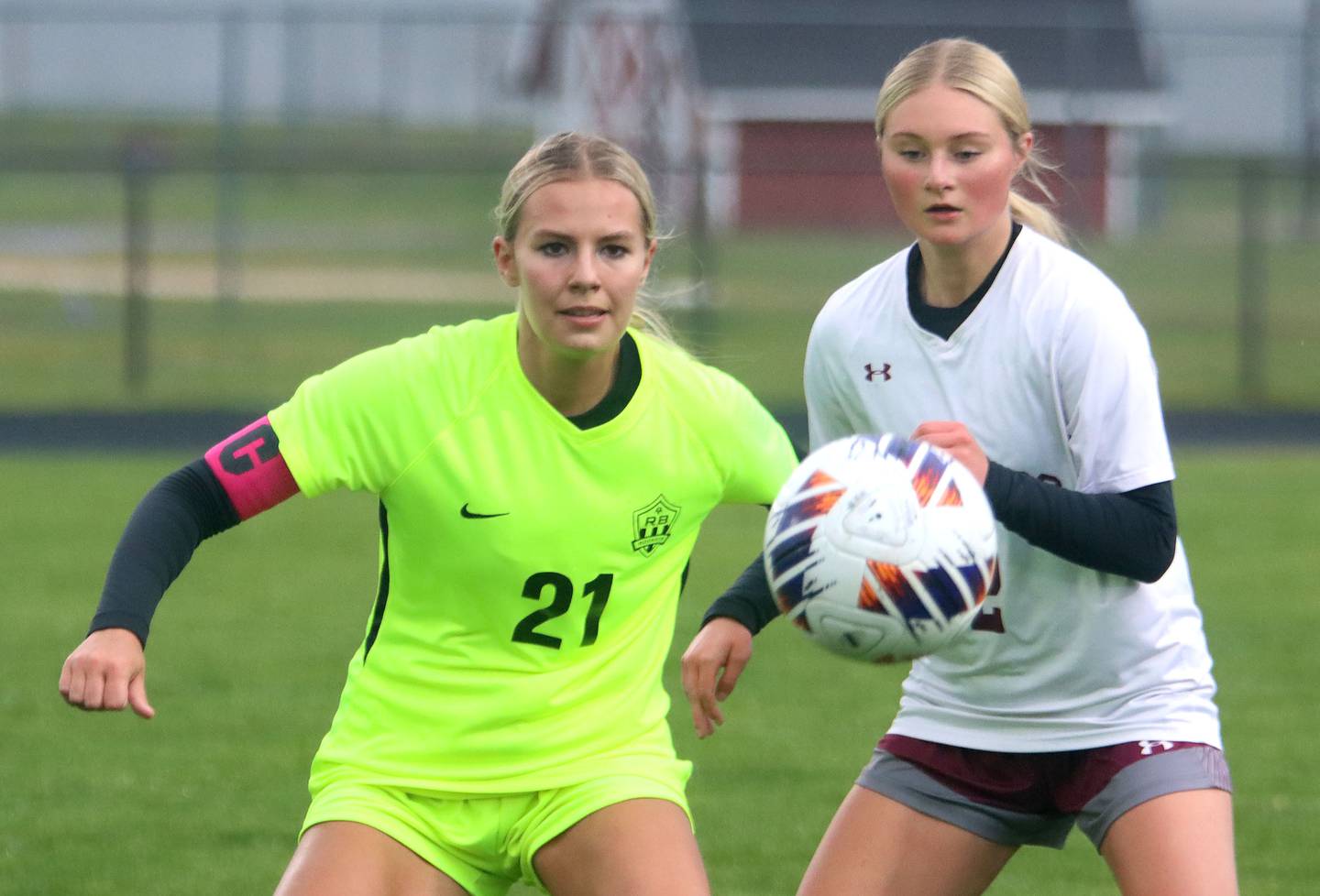 Marengo’s Myah Broughton, right, battles Richmond-Burton’s Blake Frericks  in IHSA Class 1A Regional Title Game action soccer at Marengo High School in Marengo on Wednesday, May 21, 2025.