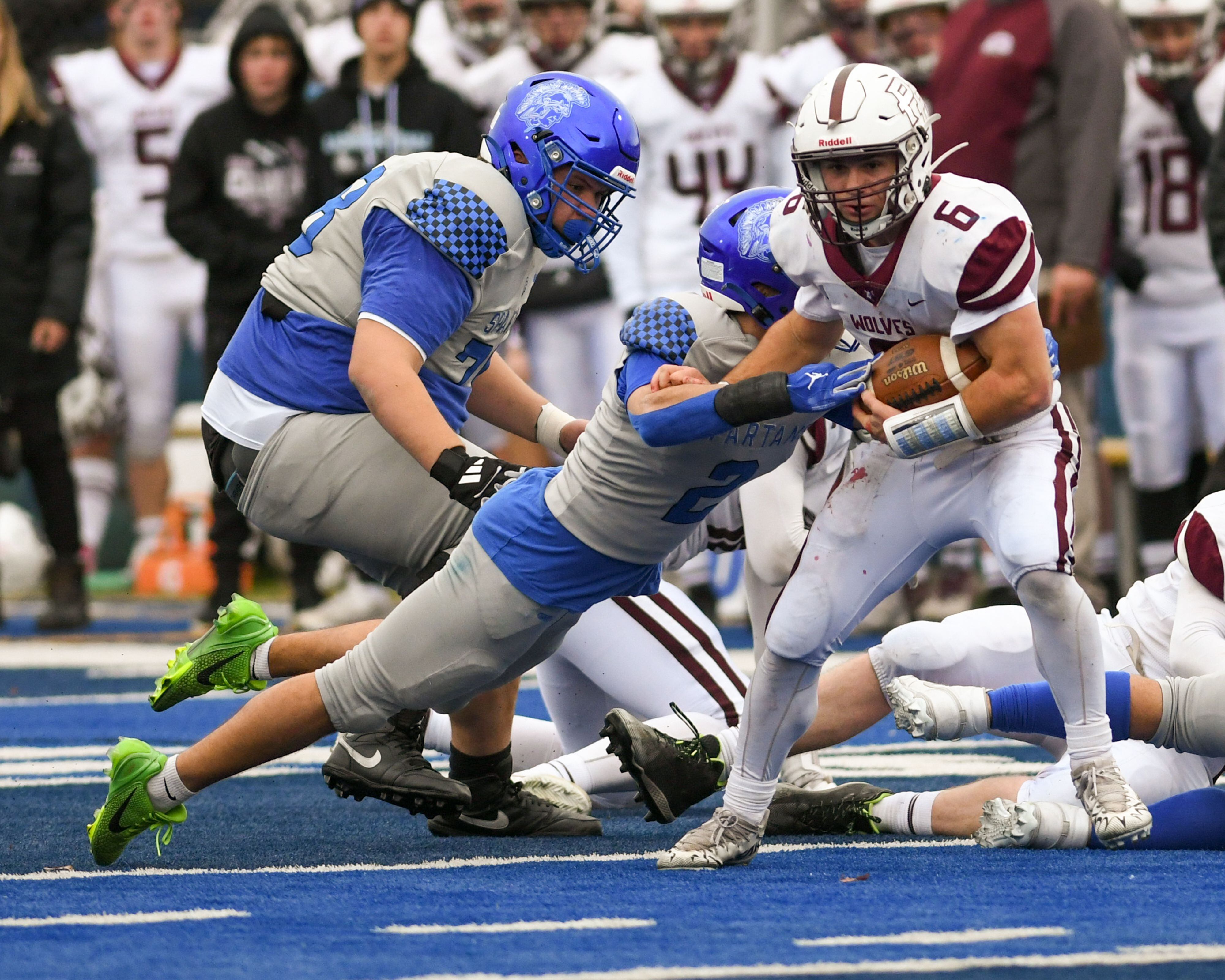 Prairie Ridge's Luke Vanderwiel (6) breaks the tackle of St. Francis's Peyton Shipley (2) on Saturday Nov. 8, 2025, during the second round of the 5A playoff game held at St. Francis's High School.