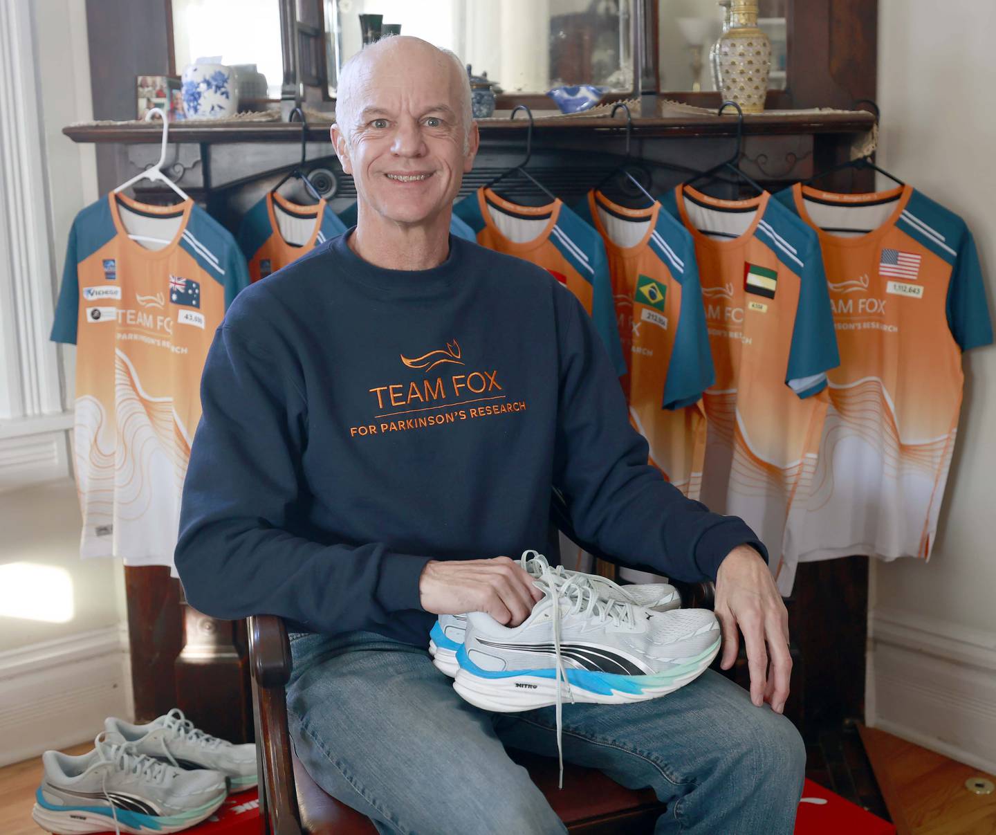 Glen Ellyn resident Lincoln Bode at his home in Glen Ellyn. Bode, a retired 63-year-old with vast prior experience, mainly "adventure running," will compete in the World Marathon Challenge's "777 Challenge" -- seven marathons on seven continents on seven straight days. Bode is running in memory of his father, Hank Bode, and to raise donations and awareness of Parkinson's disease, which afflicted his father for 9 years before his death Jan. 27, 2025.