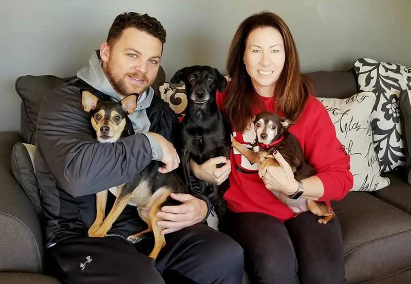 James "Jimmy" and Dawn Udesen, of Algonquin, with their dogs.