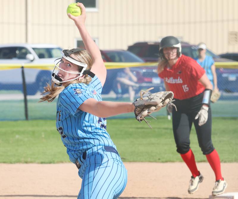 Marquette's Kinley Rick lets go of a pitch as Henry-Senachwine's Brooklynn Thompson gets ready to run from second base on Thursday, April 23, 2026 at June Cross Field in Ottawa.