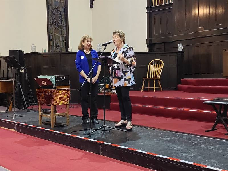 Anne Badger (left) receives a $10,000 donation from the Robert M. Eschbach Legacy Fund from Pamela Beckett, co-founder of Starved Rock Country Community Foundation, on Thursday, Sept. 28, 2023, at the Open Table United Church of Christ in Ottawa.